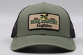 Richardson 112 cap in a classic green color with black mesh. Snap back. 